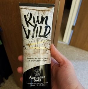 Full, new, unused bottle of Run Wild tan lotion